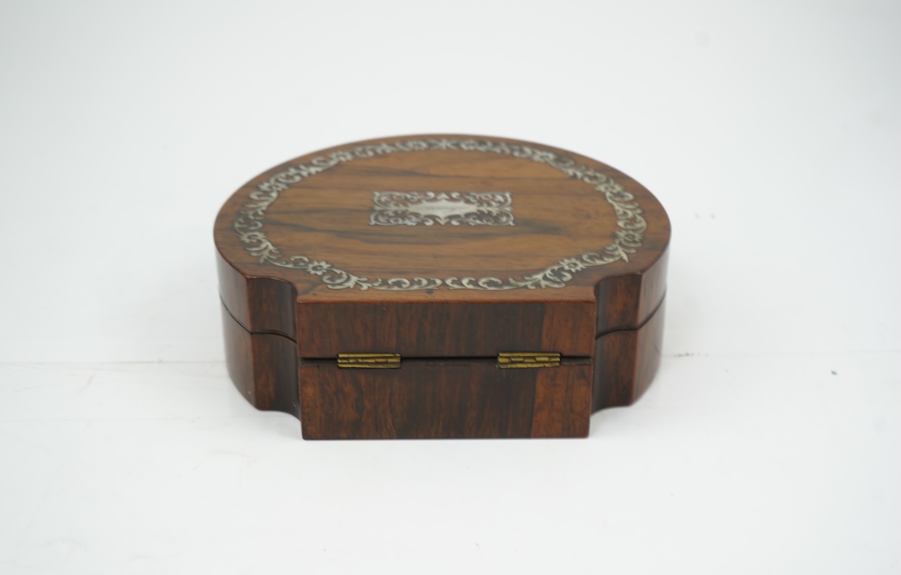 An early Victorian rosewood and mother of pearl inlaid sewing box